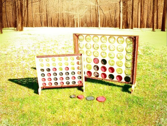 connect 4 game in the grass